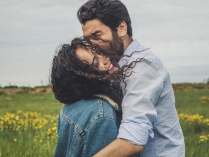 A couple embracing outdoors